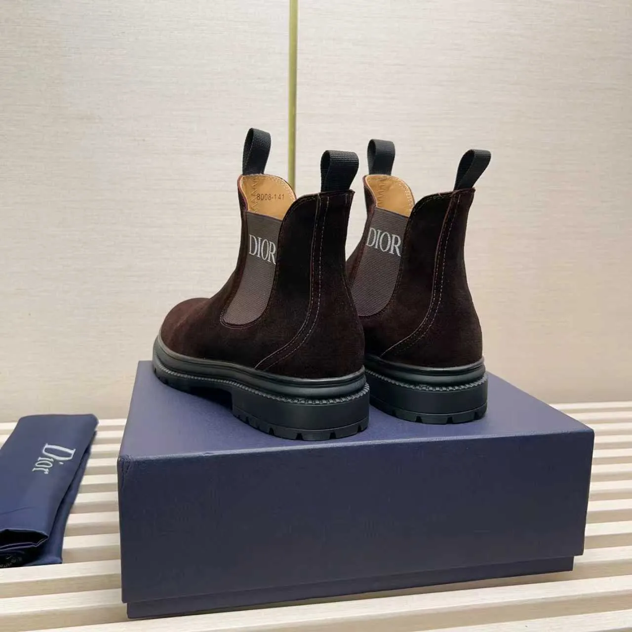Men's Shoes 💰480 Dior A practical choice that combines protection with classic style. Made from durable Rugged Calf leather, it's tumbled and hand-finished to create a soft suede feel with a rich texture. Elastic side panels and subtle cutouts are inspired by the classic Chelsea boot. Leather upper and lining with Kummel tabs at front and rear, rubber outsole